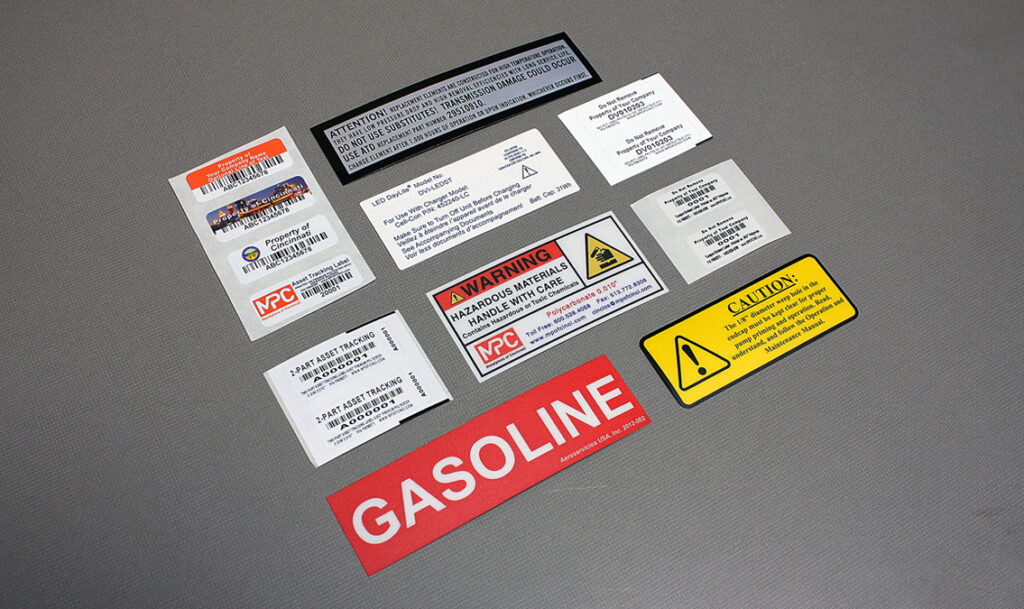 Several plastic product identifiers and labels 